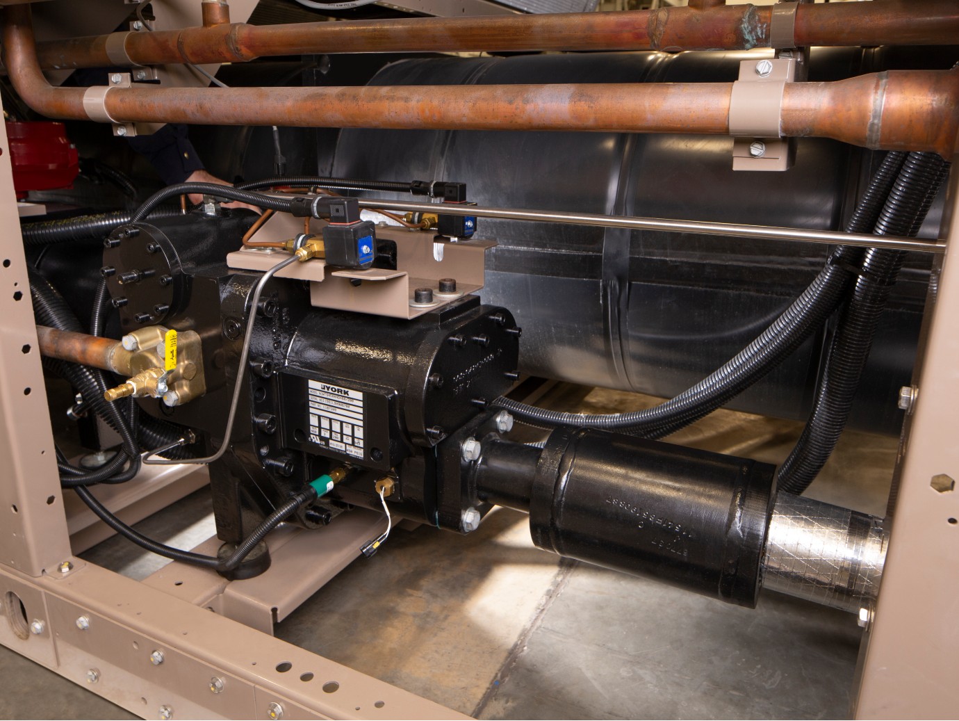 Close up shot of the compressor technology used in a YORK YVAA VSD Screw Chiller 