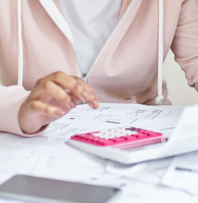 A woman using calculator